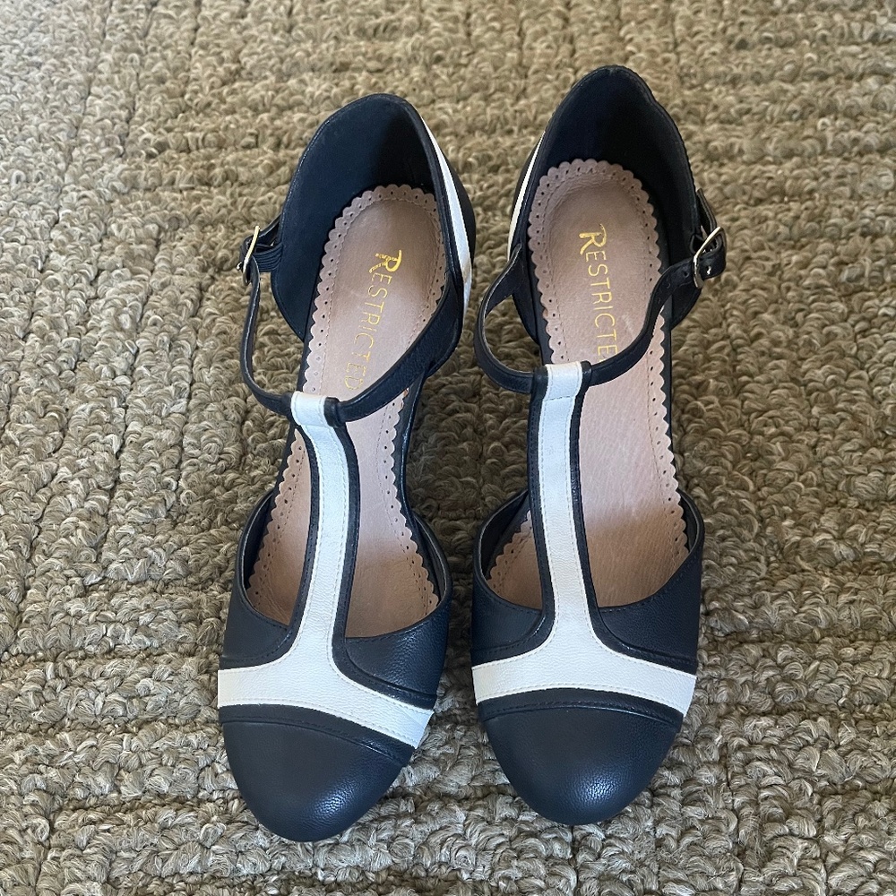 Restricted Black and White T-Bar Heels
